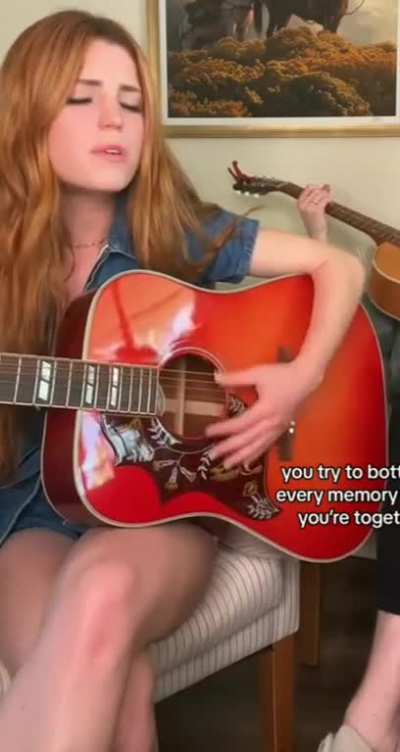 Singing along to the lyrics of 'Sour' while playing guitar (June 2023)
