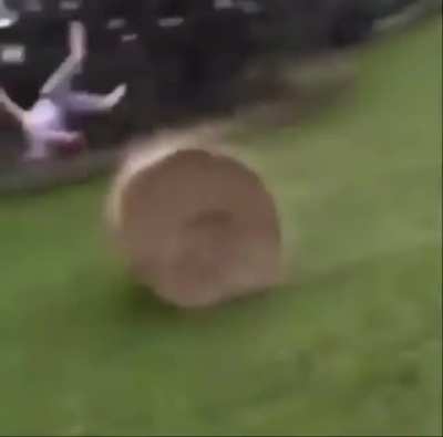 WCGW trying to jump over a hay bale