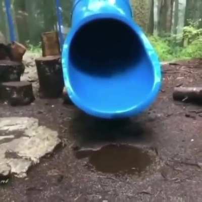 Kid starts spinning inside a slide