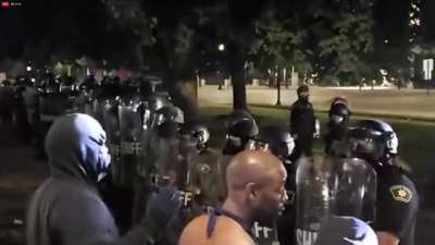 Kenosha protesters yell "why don't you shoot rapists and killers?" at police on day 1