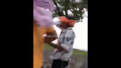 Group of men grope woman and hit her with stick