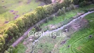A Ukrainian Army reconnaissance drone recorded video of a Russian Army BMP ditching its crew during an unsuccessful counteroffensive towards the Zaporozhye region.