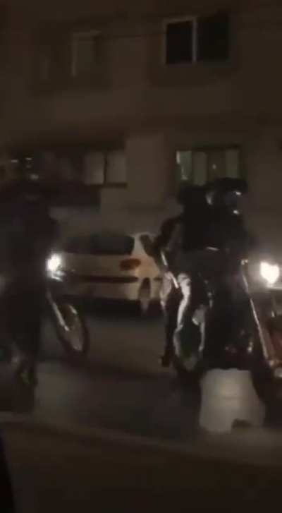 police officers dressed as civilians shoot camera woman