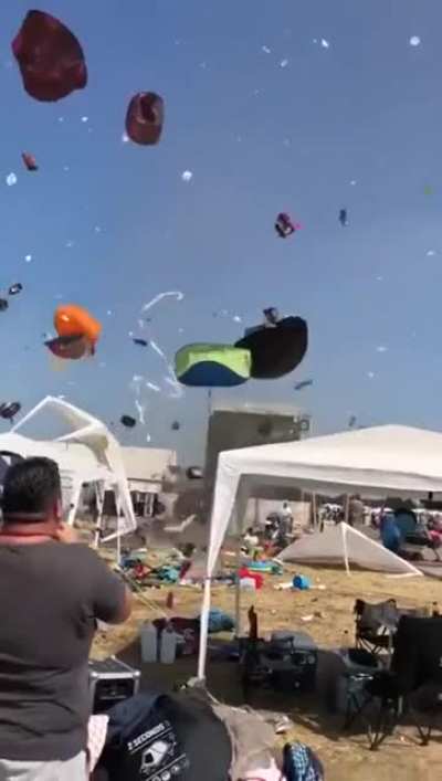 Dust devil causes problems for tourists.