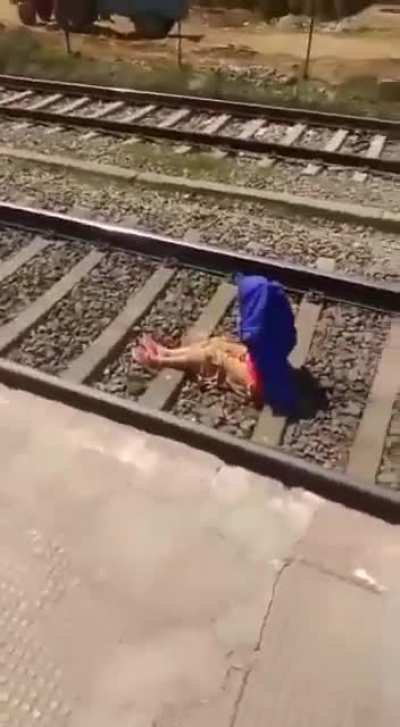 She apparently fell off the platform while talking on the phone