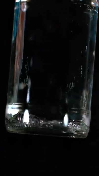 Cavitation in bottle at 82000 fps