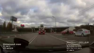 Following a cement truck.