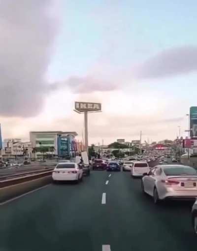 Car blocking ambulance on call