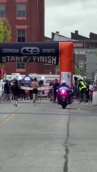Dude wins the Delaware Marathon outsprinting his opponent who already was celebrating the win
