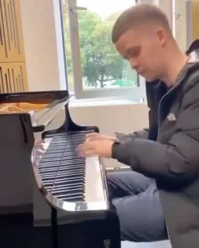 This dude is sick on his piano!