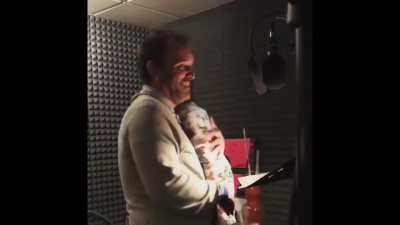 Dad helping his daughter voice-act