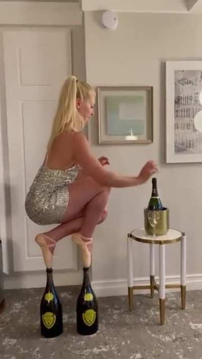 Having herself a sip of champagne 🍾