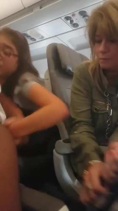 Little girl flips out on plane over her cell phone.