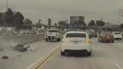 No-look illegal merge into the HOV lane, what could go wrong? Credit to my co-worker&rsquo;s Tesla cams.