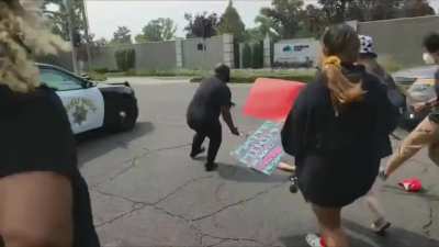 HMFT after Protester gets sent flying after jumping on highway patrol vehicle - Sacramento, CA 14th September