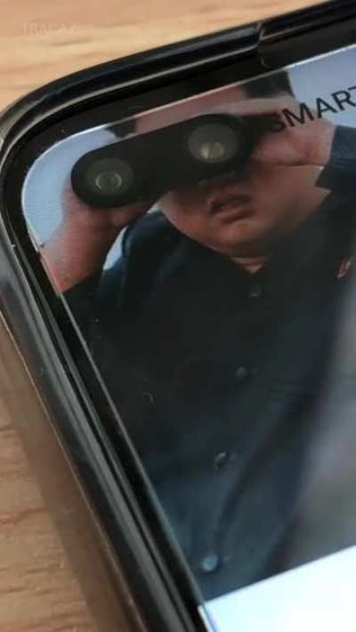 he's spying on us through our phones