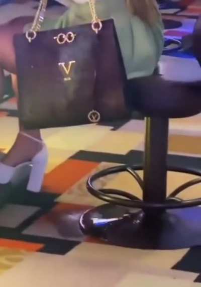 Woman pisses on floor in casino to avoid losing slot machine.