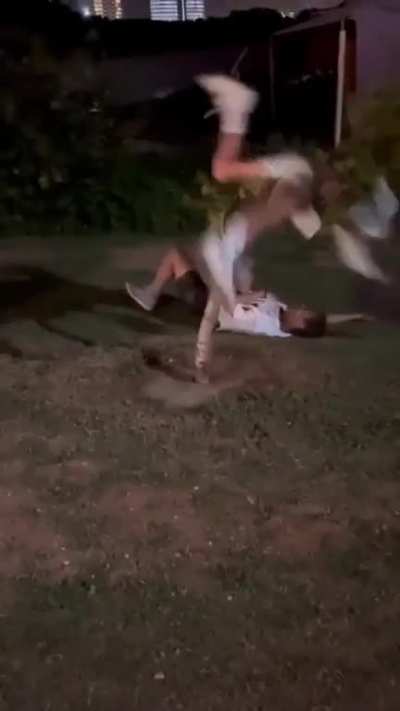South African uni students fighting a tree.