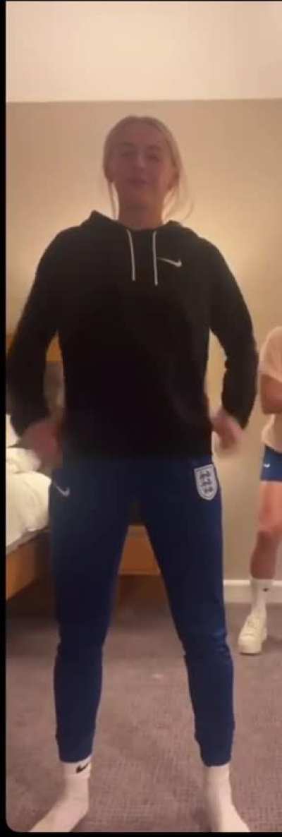 Shaking her hips..