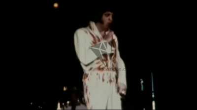 Elvis singing, "Jailhouse Rock", in Dayton, Ohio on October 26th, 1976. He's wearing the Colorful Flame Suit. He wore this jumpsuit only twice. The only other time he wore this jumpsuit was a week earlier in South Bend, Indiana on October 20th, 1976.