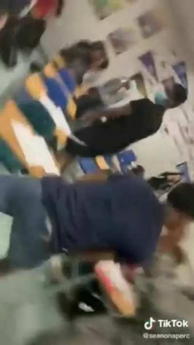Young Man beat up Airforce after she poured coffee on him.