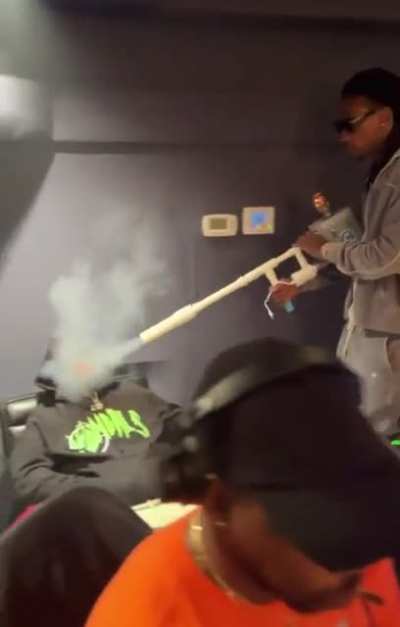 Wiz Khalifa uses weed gun to get his friend high