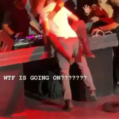 Couple ruining the concert for everyone by grinding and making out publicly.