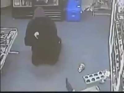 A Man enters a Muslim owned shop with the intention to rob using a baseball bat. The Muslim guy pulls out a rifle. You can see what happens next...