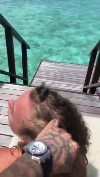 From behind!