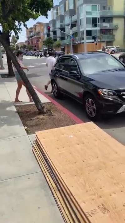 Instagram girl poses for a picture as if she is helping rebuild the community, then leaves immediately