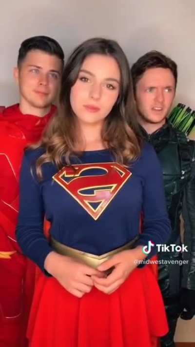 Flash and green arrow admire supergirl