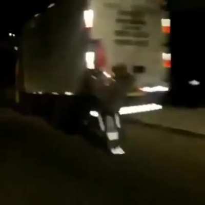 Idiot doing one wheelie.