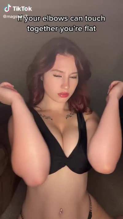 Tiktok User "polish7princess" Squeezing Her Clothed Boobs Together With Her Arms Trying And Failing To Push Her Elbows Together (Also With Slo-Mo)