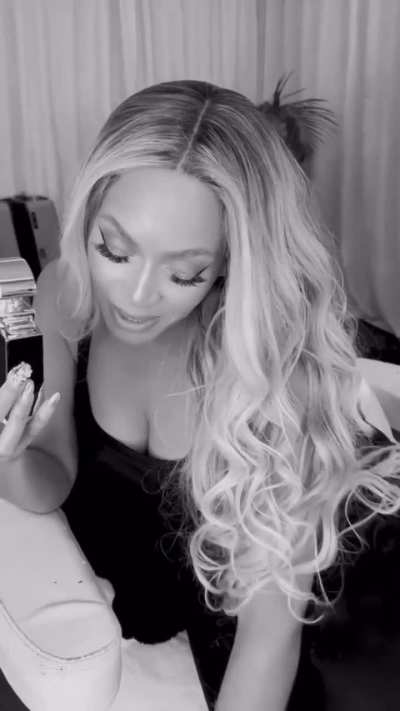 With her perfume CE NOIR
