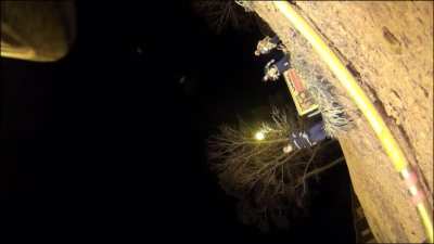 Firefighter catches child thrown from burning building