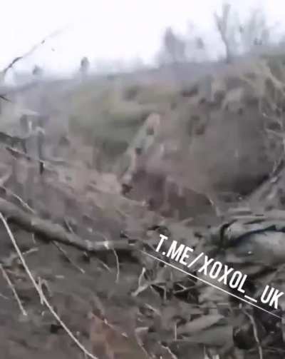 RU POV | Ukrainian soldier defending a trench with a down comrade near by