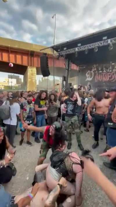 Couple getting freaky at Deathfest
