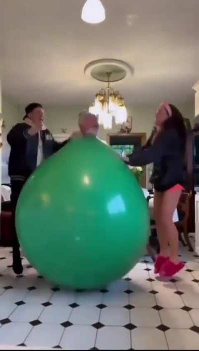 Grandpa dances in a balloon
