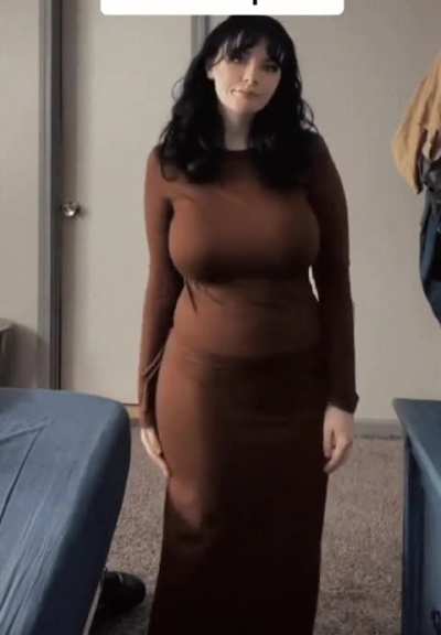 livvy loukachoo in tight brown dress