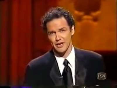 Norm Macdonald jokes about OJ Simpson murder trial and the room is decisively split on weather its funny or offensive.