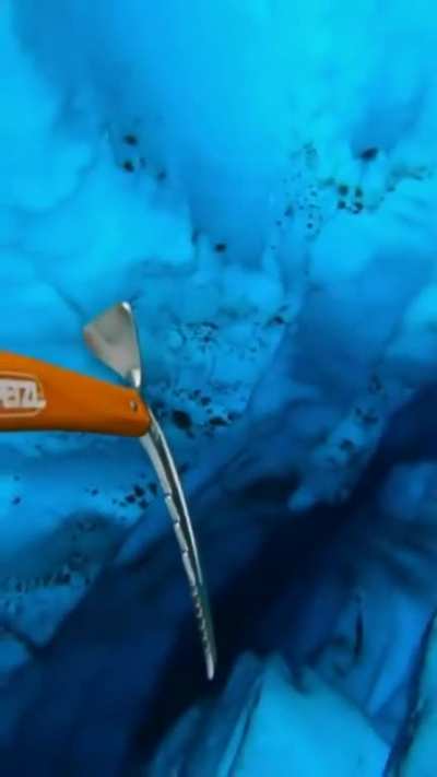 Clear, deep water beneath a glacier