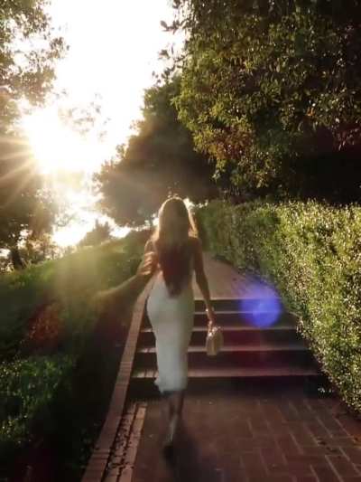 Walking away in white dress - IG January 2026