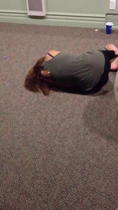 I can stand up on an exercise ball. She said she could do it. So I bet $20 she couldn’t...