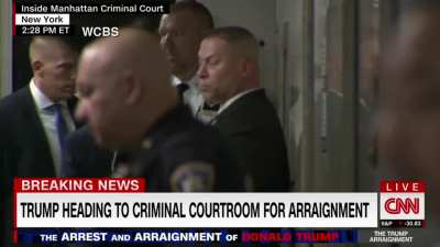 Man who chanted "Lock Her Up" about his political rivals under arrest on his way to arraigment