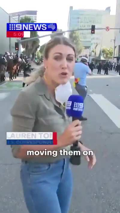 9NEWS reporter Lauren Tomasi hit by LAPD Rubber Bullet