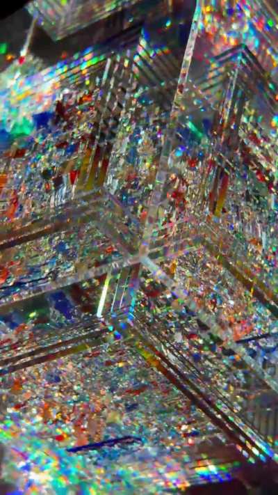 Coldworked glass cube by Jon Kuhn.
