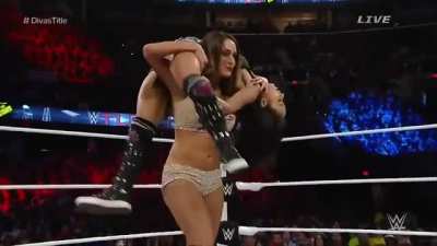 Nikki dominating AJ Lee