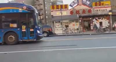 Trying to trash a car with the driver being inside it.