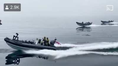 Dude is literally flying in the air in a jet suit