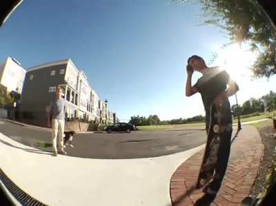 Man with nothing better to do gets in face of skateboarders and uses dog as an intimidation tactic